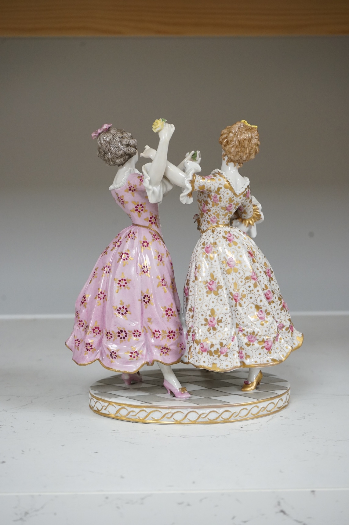 A Continental porcelain group of two dancers, 20cm high